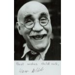 Warren Mitchell signed 6x4 inch black and white photo. Good Condition Est