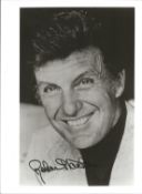 Robert Stack signed 10x8 inch black and white photo. Good Condition Est