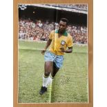 Pele signed 34x24 inch colour canvas pictured early on in his career playing for Brazil. Folded.