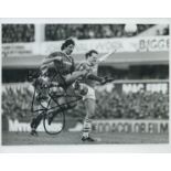 Mark Lawrenson signed 10x8 inch black and white photo pictured in action for Liverpool.