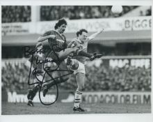 Mark Lawrenson signed 10x8 inch black and white photo pictured in action for Liverpool.