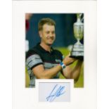 Henrik Stenson 14x11 inch mounted signature piece includes signed album page and colour photo