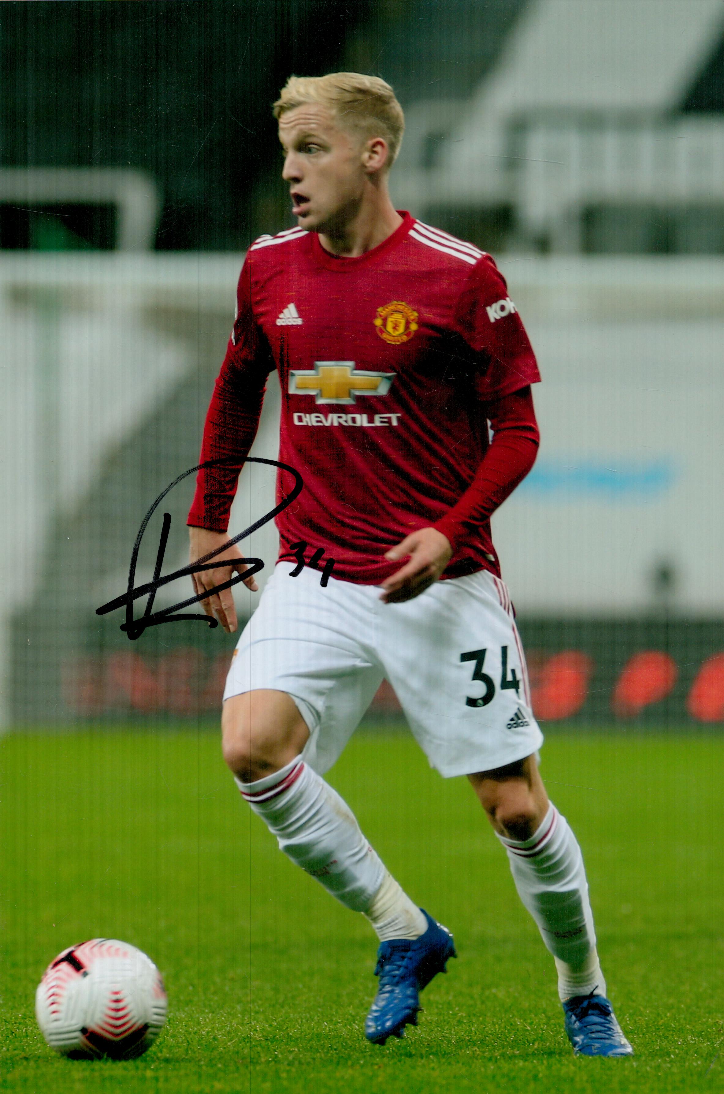 Football Donny van de Beek signed 12x8 inch colour photo pictured in action for Manchester United.