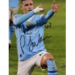 Phil Foden signed 8x6inch colour photo. Man City midfielder. Good Condition. All autographs come