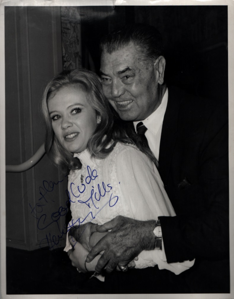 Hayley Mills, English actress. A vintage signed and dedicated 10x8 photo, in an embrace with boxer