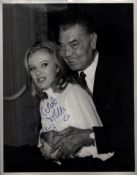 Hayley Mills, English actress. A vintage signed and dedicated 10x8 photo, in an embrace with boxer
