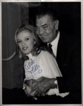 Hayley Mills, English actress. A vintage signed and dedicated 10x8 photo, in an embrace with boxer