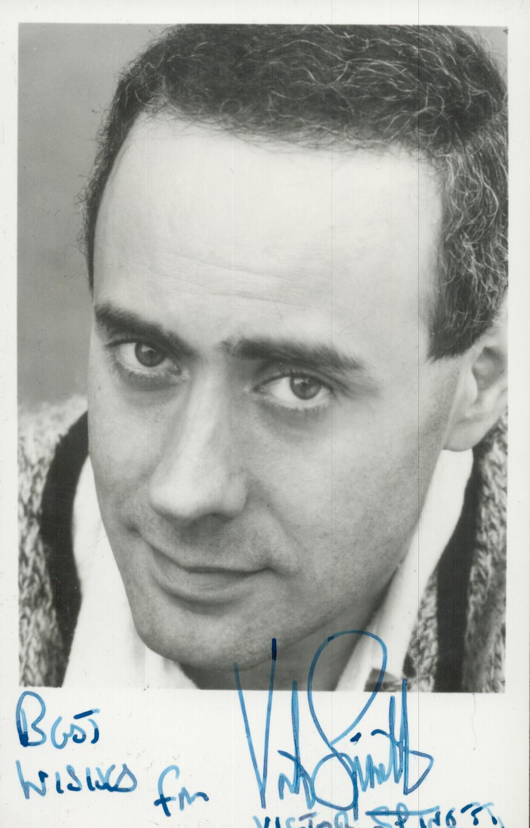 Victor Spinetti signed 5.5x3.5 inch black and white photo. Good Condition. All autographs come