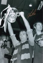 Football Autographed IAN ROSS 12 x 8 Photo : B/W, depicting Aston Villa captain IAN ROSS holding