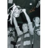 Football Autographed IAN ROSS 12 x 8 Photo : B/W, depicting Aston Villa captain IAN ROSS holding