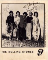 The Rolling Stones multi signed 10x8 inch promo photo. Signatures from all five members Ronnie Wood,