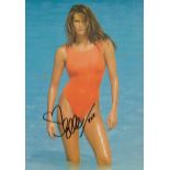 Elle Macpherson signed Colour Post Card Approx. 8.25x6 Inch. Is an Australian model,