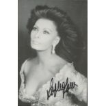Sophia Loren signed 6x4inch black and white photo. Good Condition. All autographs come with a