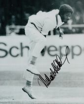 Michael Holding signed Black and White Photo 10x8 Inch. Is a Jamaican former cricketer and