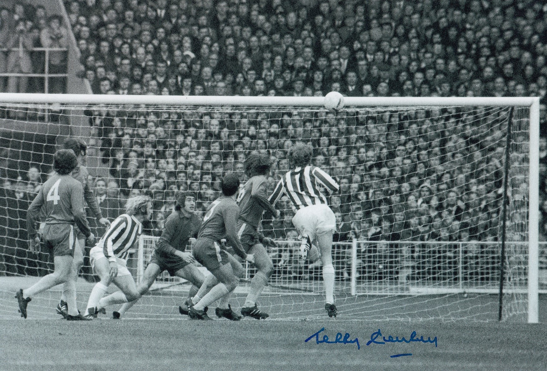 Football Autographed TERRY CONROY 12 x 8 Photo : B/W, depicting Stoke City's TERRY CONROY scoring