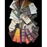 British Post Office mint stamp collection. 40+ individual sets still in original packs. Includes