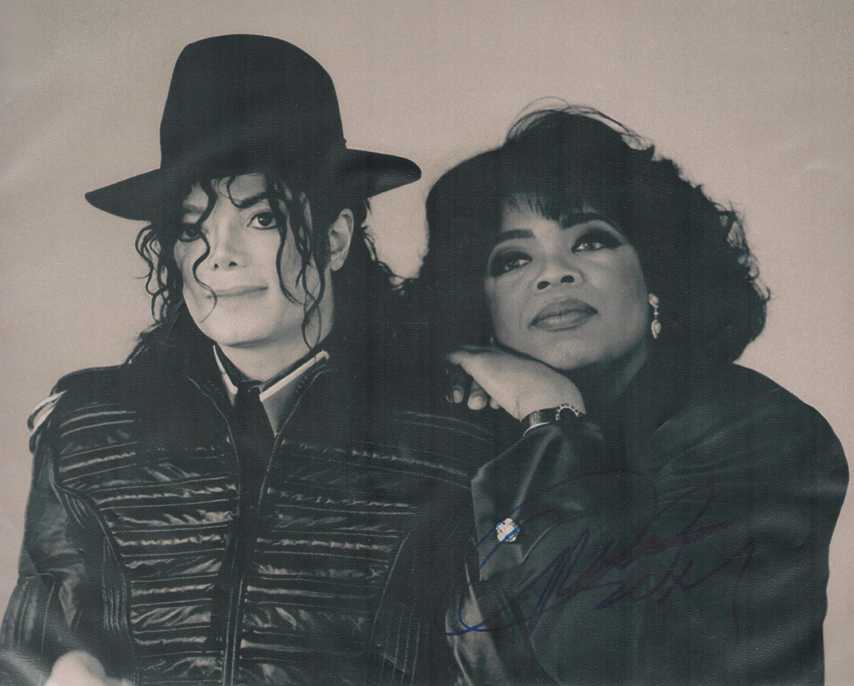 Oprah Winfrey signed black and white photo taken with Michael Jackson unsigned 10x8 Inch. Is an