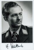 WWII Lieutenant Heinrich Starke signed 6x4 inch black and white photo. Luftwaffe fighter ace. Good