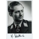 WWII Lieutenant Heinrich Starke signed 6x4 inch black and white photo. Luftwaffe fighter ace. Good