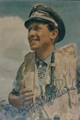 WWII Oberleutnant Ernst Wilheim Reinart signed 7x5 inch colour photo. Good Condition. All autographs