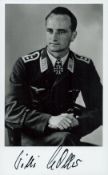 WWII Lieutenant Wilhelm Noller signed 6x4 inch black and white photo. Luftwaffe fighter ace. Good