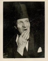 Tommy Cooper signed 3x2inch black and white photo with Josef Locke on reverse. Good condition Est.