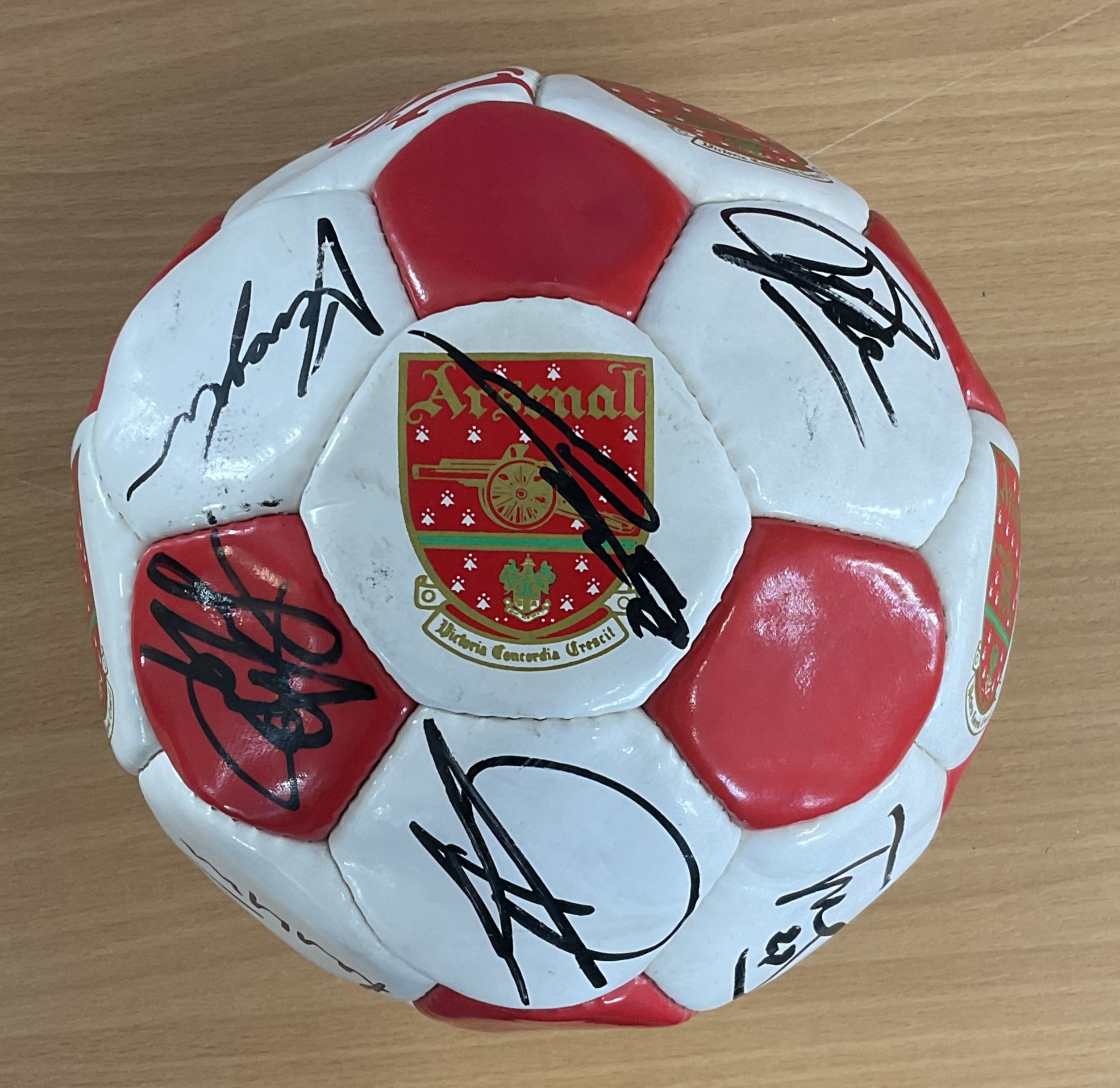 Vintage Arsenal multi signed football by names such as Robin van Persie, Tony Adams, Tomas