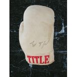 Charlie Magri signed white signed Title boxing glove. Carmel Magri (born 20 July 1956), who boxed