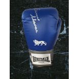 Earnie Shavers signed blue lonsdale boxing glove.
