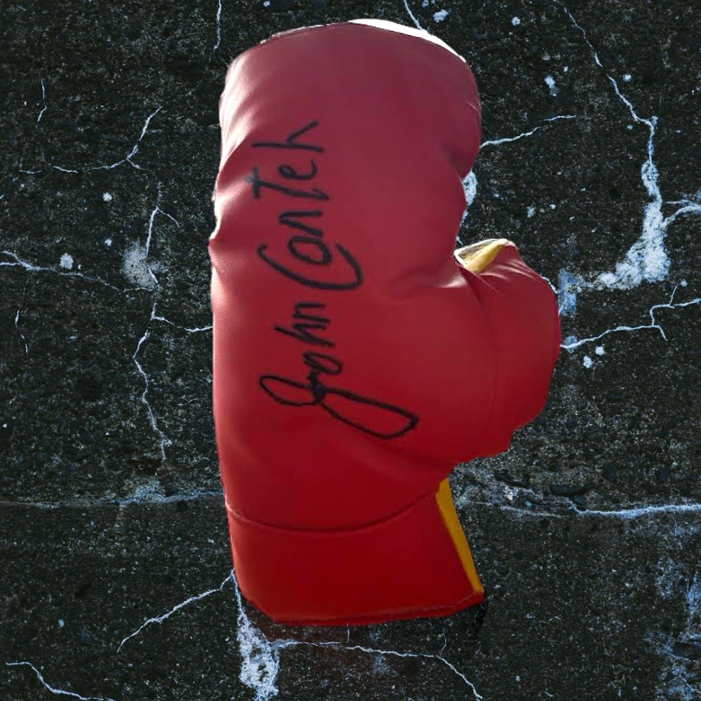 John Conteh signed red small red boxing glove. John Anthony Conteh, MBE (born 27 May 1951) is a