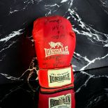 Tim Witherspoon signed red Lonsdale 16oz boxing glove. Tim Witherspoon (born December 27, 1957) is