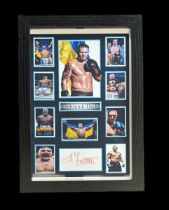 Olesandr Usyk signed white card. Framed and mounted with colour photos. Approx overall size