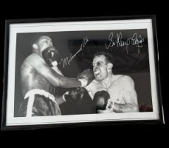 Henry Cooper and Muhammad Ali printed signatures on black and white photo. Framed to approx size