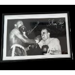 Henry Cooper and Muhammad Ali printed signatures on black and white photo. Framed to approx size