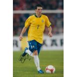 Elano signed 12x8 inch colour photo pictured in action for Brazil. Good condition. All autographs