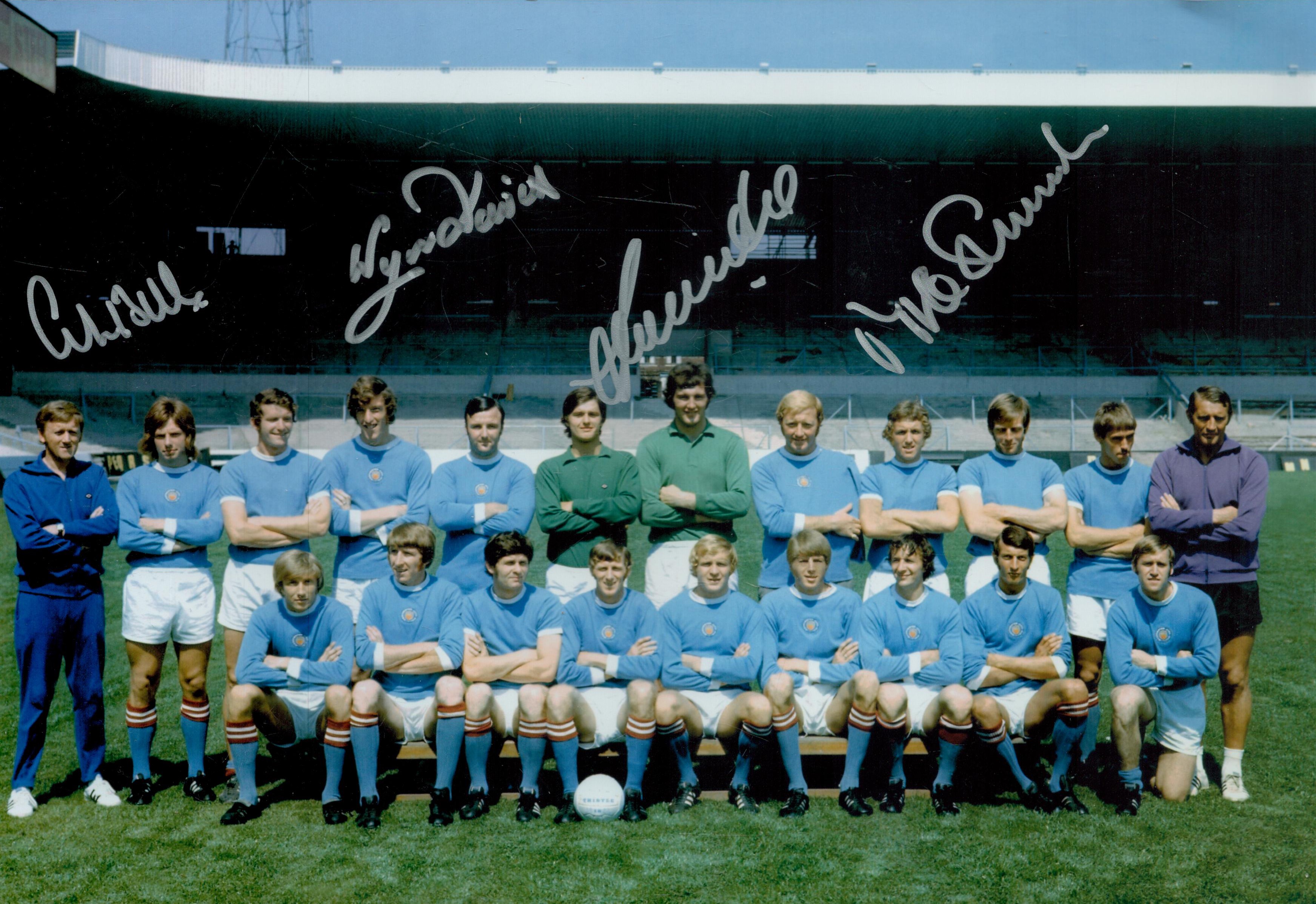 Multi signed Mike Summerbee, OBE plus 3 others Colour Photo 12x8 Inch. Good condition. All
