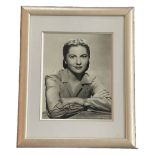 Joan Fontaine signed mounted and framed black and white photo. Good condition Est.