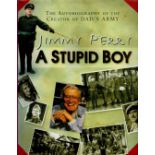 Jimmy Perry signed A stupid boy hardback book. Signed on inside title page. Dedicated. Good