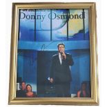 Donny Osmond signed 11x9 inch overall framed colour photo. Is an American singer, dancer, actor,