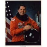 David C Leestma signed 10x8inch official NASA spacesuit photo. Dedicated. Good condition Est.