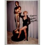 Debbie Reynolds (1932-2016), American actress. A signed 10x8 inch photo. Her breakout role was her