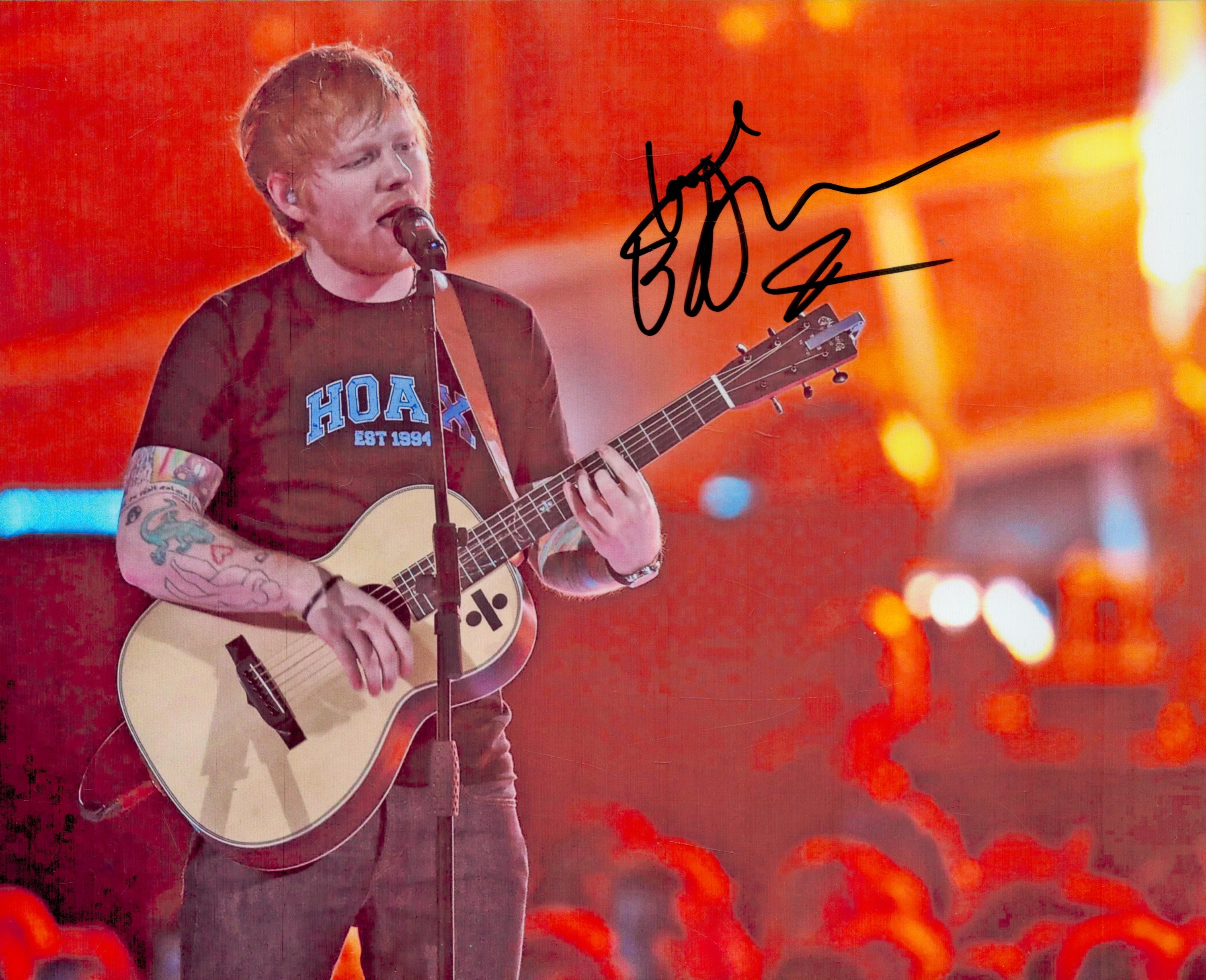 Ed Sheeran signed 10x8inch colour photo. Good Condition. All autographs come with a Certificate of