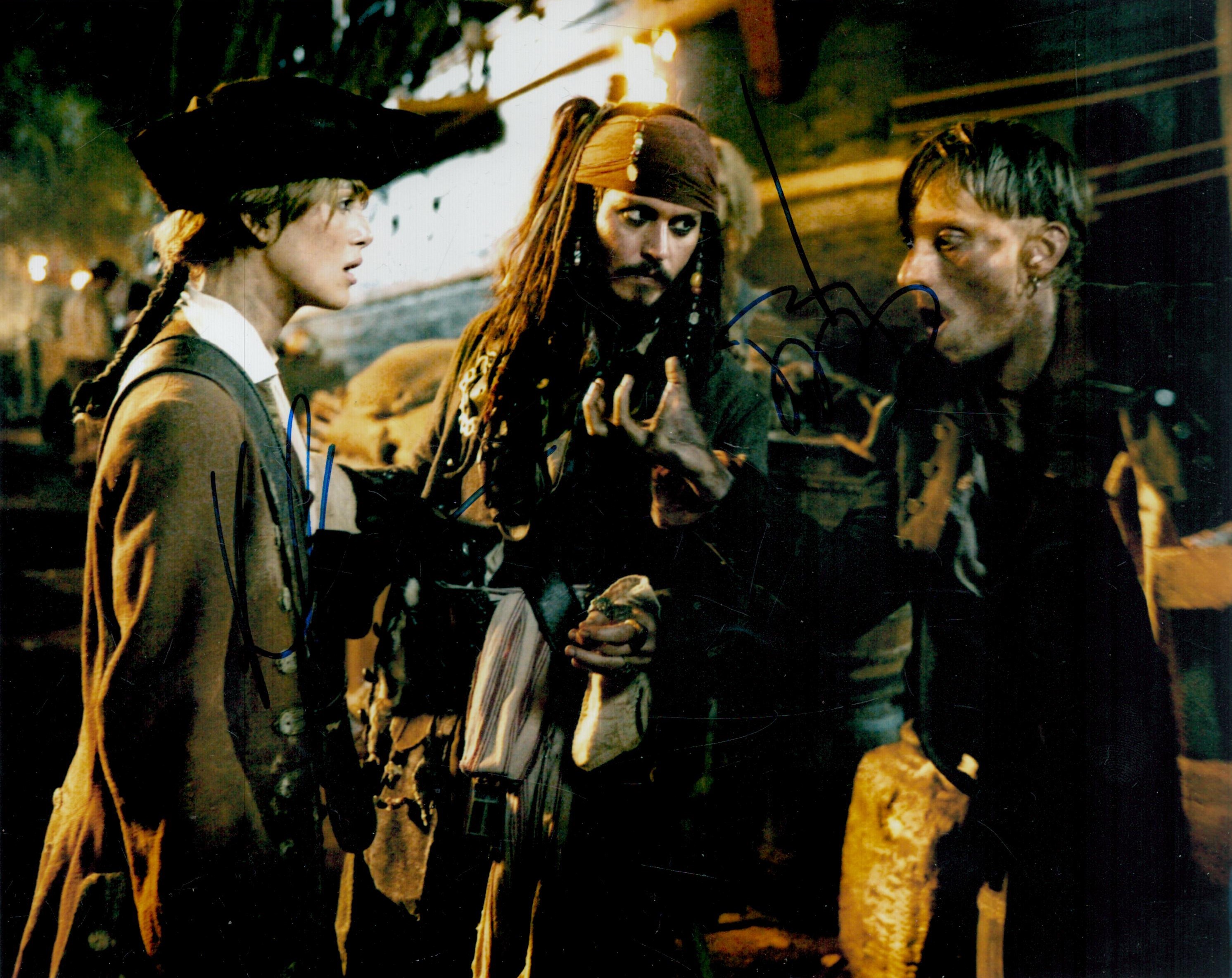 Keira Knightley and Johnny Depp signed 10x8inch colour Pirates of the Caribbean photo. Good