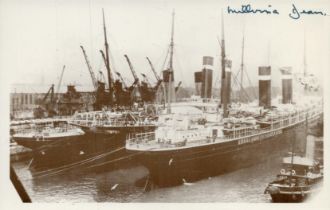 Titanic Survivor Millvina Dean signed 6 x 4 inch b/w Titanic in docks postcard. The Deans were not