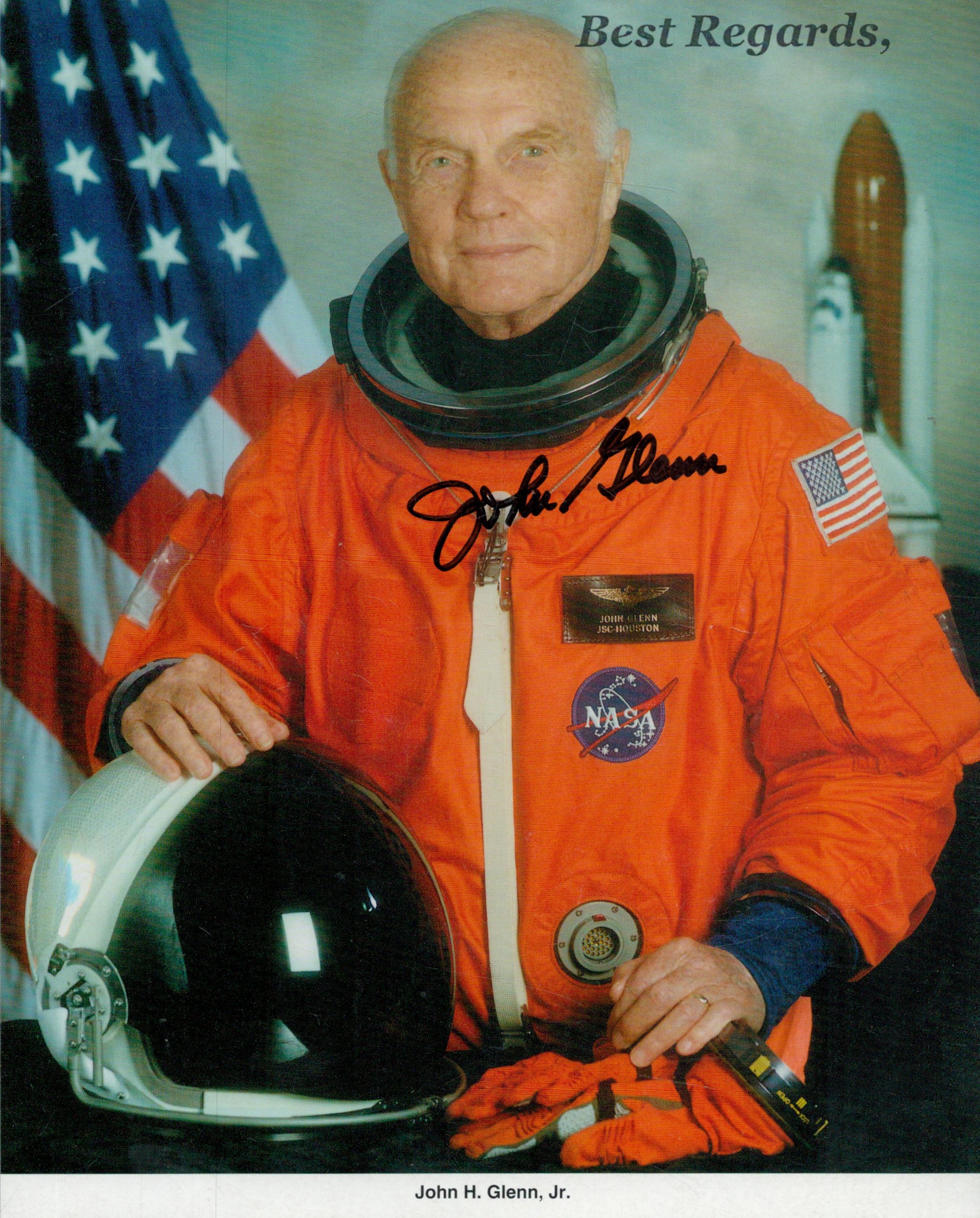 Astronaut John Glenn signed 8 x 6 inch colour Orange Space Suit Shuttle photo. Good Condition. All