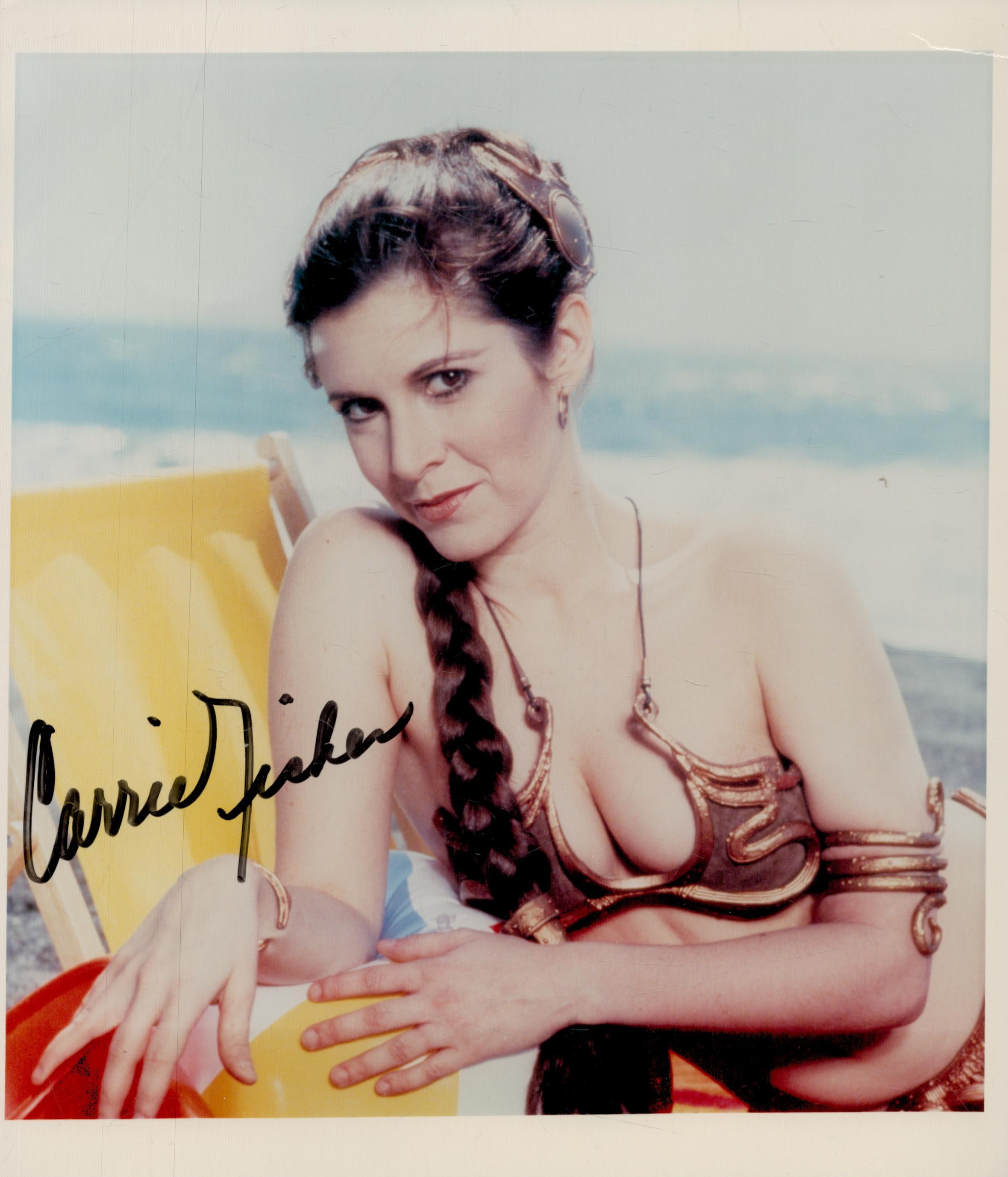 Carrie Fisher signed 10x8inch colour photo. Good Condition. All autographs come with a Certificate