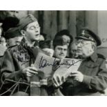 Dads Army Ian Lavender signed 10 x 8 inch b/w photo singing with Arthur Lowe, rare inscribed Tra