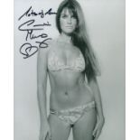 Caroline Munro James Bond actress signed sexy 10 x 8 inch b/w swim suit photo. Good Condition. All