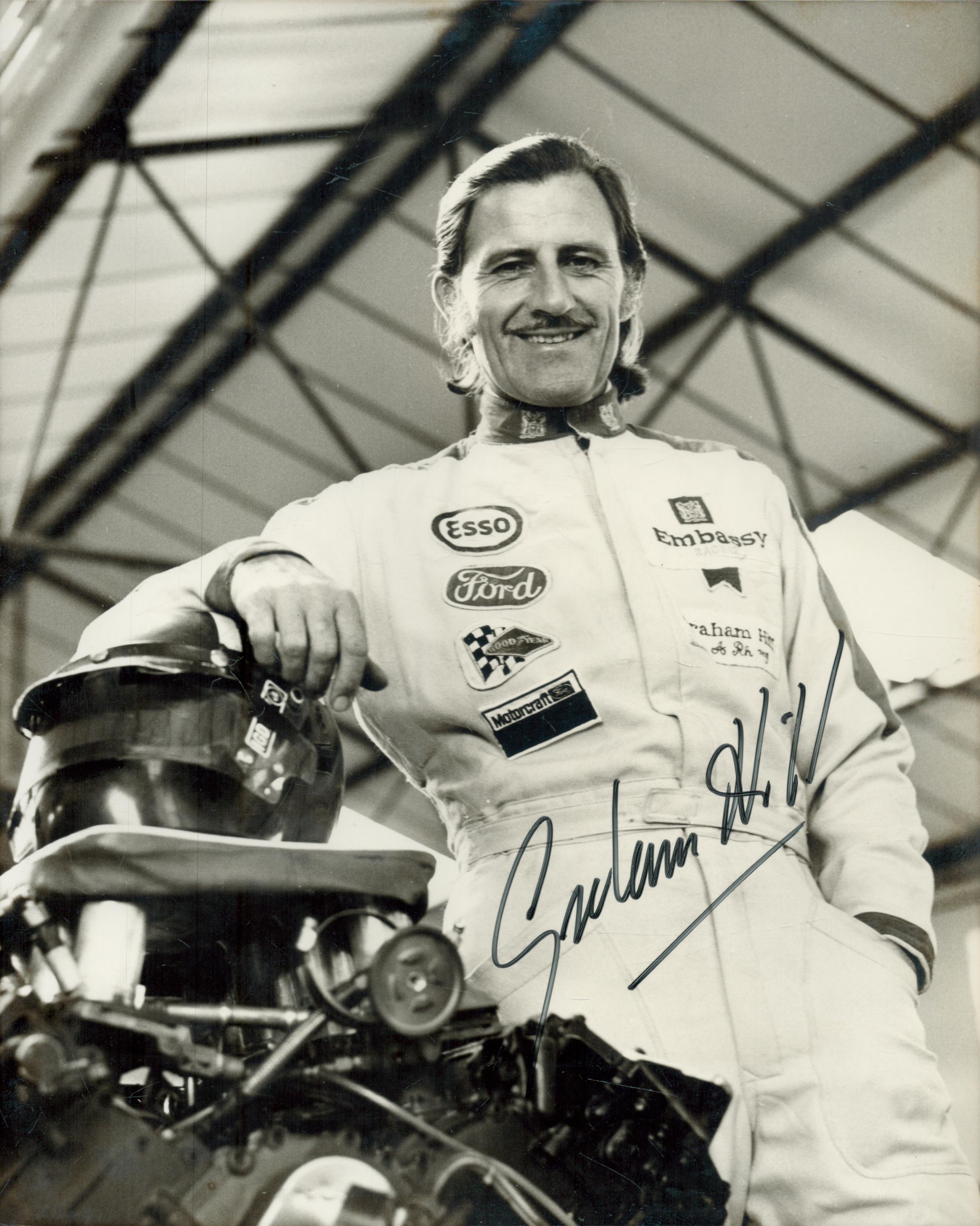 Formula 1 Graham Hill signed rare 10 x 8 inch b/w photo in racing suit, very tough to find in this
