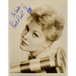 Kim Novack signed 10x8 inch vintage sepia promo photo. Good Condition. All autographs come with a